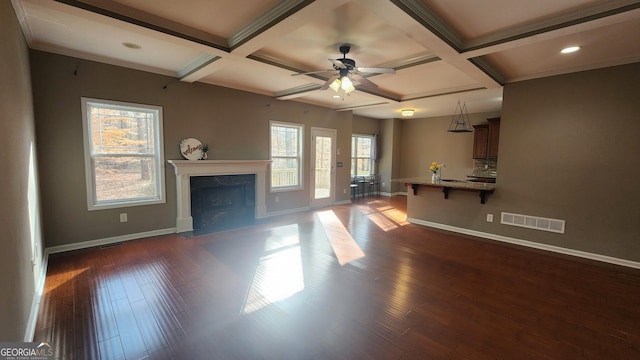 488 Morris Rd, Hiram, GA 30141 - unfurnished living room with coffered ceiling, a premium fireplace, ceiling fan, wood finished floors, and beamed ceiling
