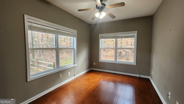 488 Morris Rd, Hiram, GA 30141 - empty room with hardwood / wood-style floors and ceiling fan