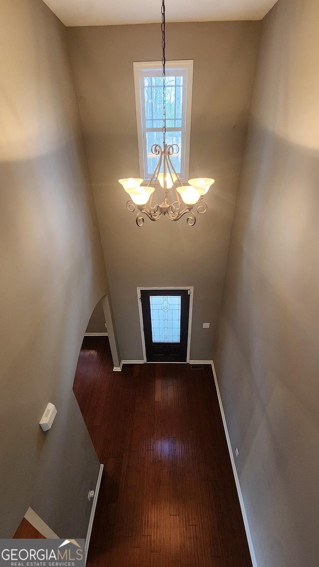 488 Morris Rd, Hiram, GA 30141 - entryway with dark wood-style floors and a chandelier