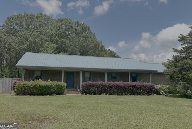 260 Willis Rd, Sharpsburg, GA 30277 - ranch-style house featuring a porch, brick siding, and a metal roof