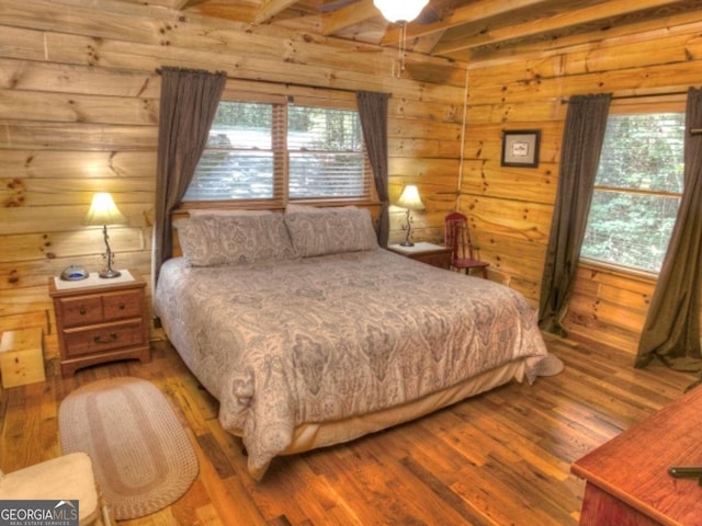 97 Eagles Nest Rd, Sautee Nacoochee, GA 30571 - bedroom featuring wood finished floors, multiple windows, and wooden walls