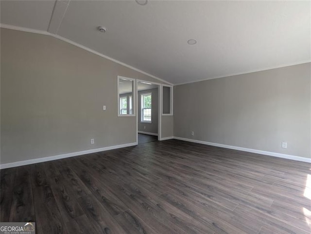 732 Five Points Rd, Buchanan, GA 30113 - spare room with lofted ceiling, ornamental molding, dark wood-type flooring, and a smoke detector