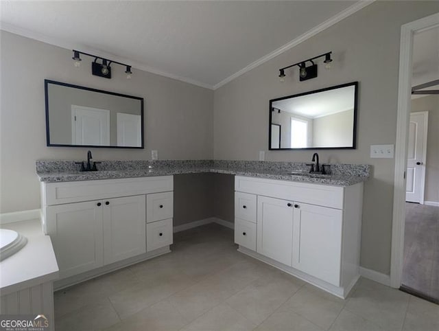 732 Five Points Rd, Buchanan, GA 30113 - bathroom featuring ornamental molding, two vanities, and rail lighting