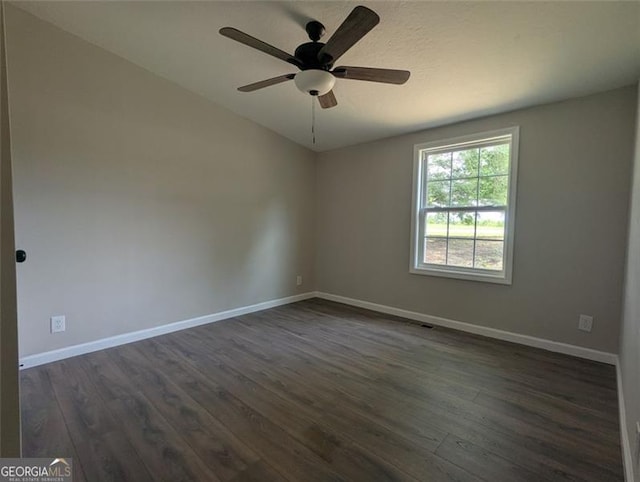 732 Five Points Rd, Buchanan, GA 30113 - spare room featuring dark wood-type flooring and ceiling fan