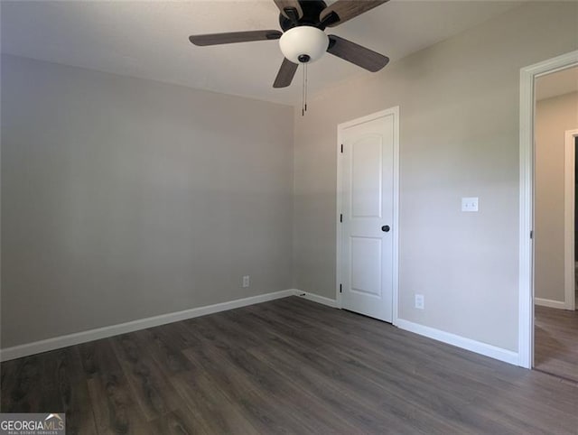 732 Five Points Rd, Buchanan, GA 30113 - spare room featuring dark wood-style floors and ceiling fan