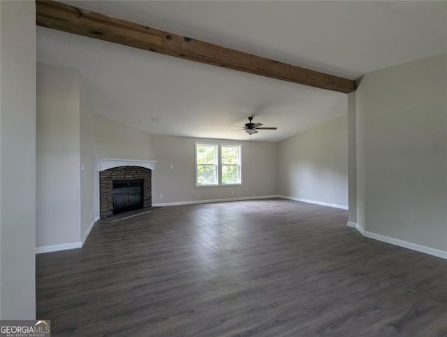 732 Five Points Rd, Buchanan, GA 30113 - unfurnished living room with a ceiling fan, dark wood-style flooring, and a stone fireplace