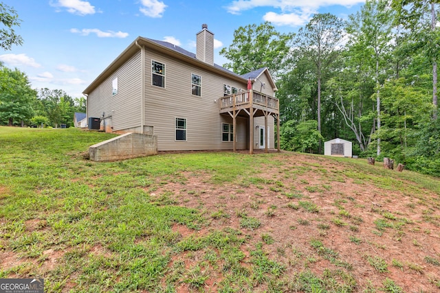 481 Hunter Welch Pkwy, Luthersville, GA 30251 - rear view of property featuring a storage unit, a wooden deck, a lawn, and a chimney