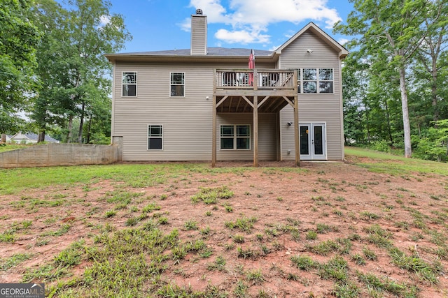 481 Hunter Welch Pkwy, Luthersville, GA 30251 - rear view of house with french doors, a deck, and a chimney