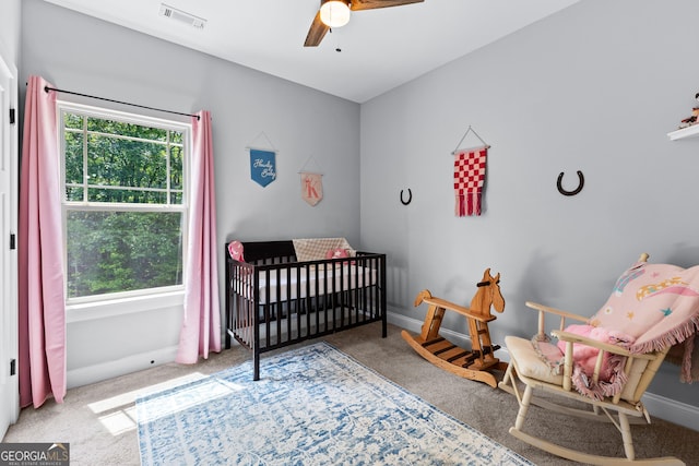 481 Hunter Welch Pkwy, Luthersville, GA 30251 - bedroom featuring carpet floors, a nursery area, and a ceiling fan