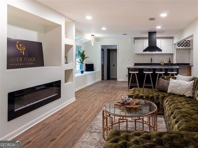 3790 Village, Atlanta, GA 30331 - living area with wood finished floors, recessed lighting, and bar