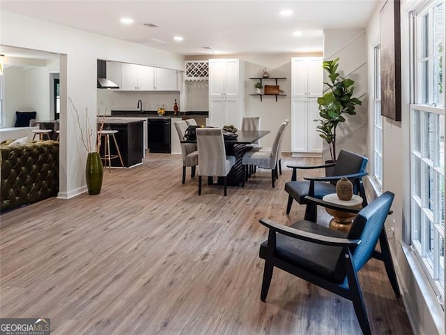 3790 Village, Atlanta, GA 30331 - dining space featuring plenty of natural light, light wood finished floors, bar with sink, and recessed lighting