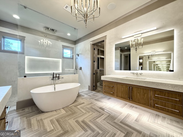 1005 Haddie Way, Alpharetta, GA 30004 - full bath featuring a chandelier, vanity, plenty of natural light, and recessed lighting
