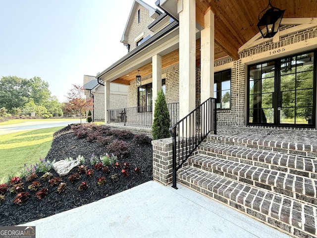 1005 Haddie Way, Alpharetta, GA 30004 - entrance to property featuring brick siding and covered porch