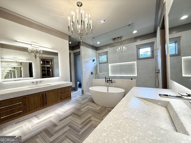 1005 Haddie Way, Alpharetta, GA 30004 - full bathroom featuring a chandelier, walk in shower, vanity, and a soaking tub