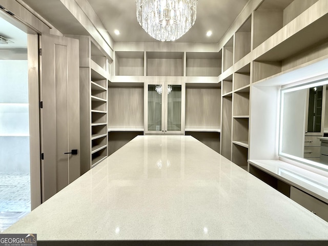 1005 Haddie Way, Alpharetta, GA 30004 - spacious closet featuring a chandelier