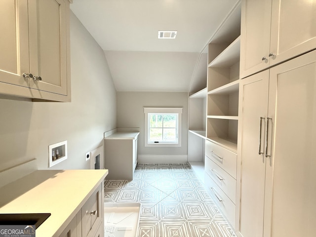 1005 Haddie Way, Alpharetta, GA 30004 - washroom with cabinet space, electric dryer hookup, washer hookup, and light tile patterned floors