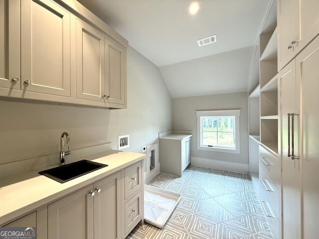 1005 Haddie Way, Alpharetta, GA 30004 - washroom with electric dryer hookup, cabinet space, washer hookup, and light tile patterned floors
