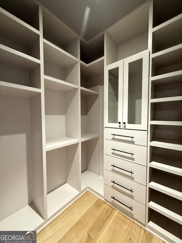 1005 Haddie Way, Alpharetta, GA 30004 - spacious closet featuring light wood-type flooring