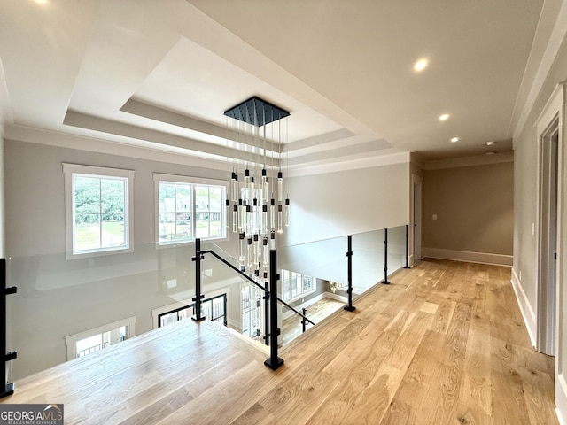 1005 Haddie Way, Alpharetta, GA 30004 - stairway with a tray ceiling, wood finished floors, crown molding, and recessed lighting