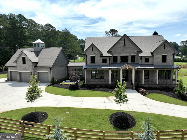 1005 Haddie Way, Alpharetta, GA 30004 - view of front of house featuring covered porch, curved driveway, a garage, and roof with shingles