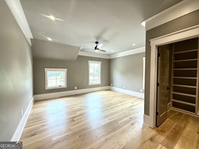 1005 Haddie Way, Alpharetta, GA 30004 - spare room with crown molding, a ceiling fan, and light wood-style floors