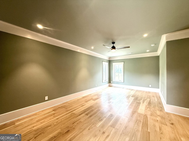 1005 Haddie Way, Alpharetta, GA 30004 - unfurnished room featuring crown molding, a ceiling fan, light wood-style floors, and recessed lighting