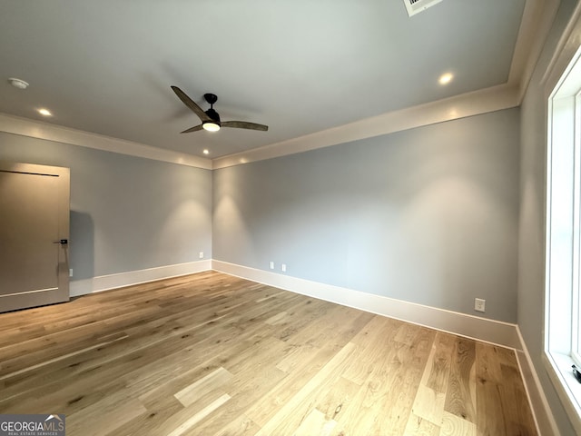 1005 Haddie Way, Alpharetta, GA 30004 - spare room with a ceiling fan, crown molding, wood finished floors, and recessed lighting