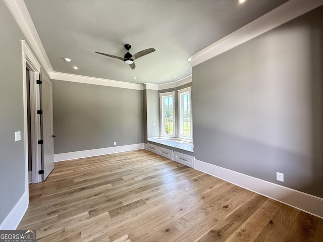 1005 Haddie Way, Alpharetta, GA 30004 - empty room with a ceiling fan, crown molding, light wood-style floors, and recessed lighting