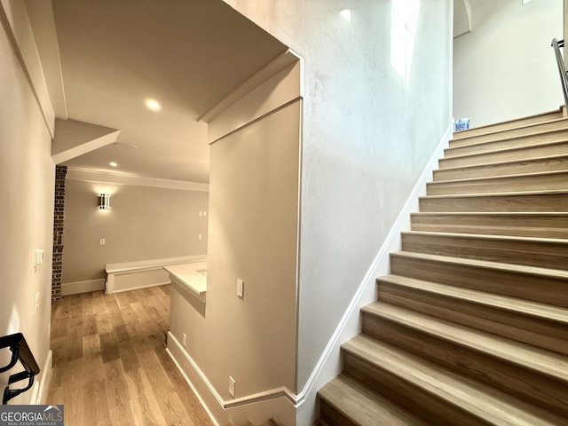 1005 Haddie Way, Alpharetta, GA 30004 - staircase featuring ornamental molding, wood finished floors, and recessed lighting
