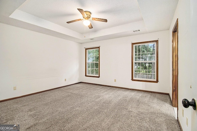 4214 Fiddlers Bnd, Loganville, GA 30052 - carpeted spare room with a raised ceiling, healthy amount of natural light, and ceiling fan