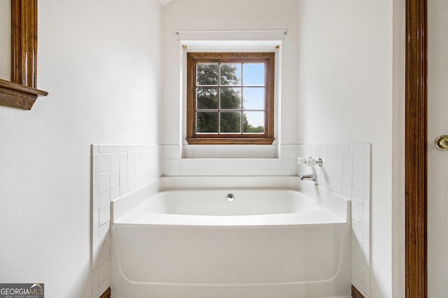 4214 Fiddlers Bnd, Loganville, GA 30052 - bathroom with a bath