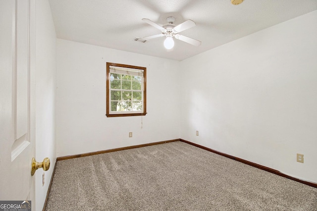 4214 Fiddlers Bnd, Loganville, GA 30052 - unfurnished room with carpet flooring and a ceiling fan