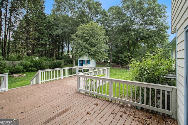 4214 Fiddlers Bnd, Loganville, GA 30052 - deck featuring a shed and view of scattered trees