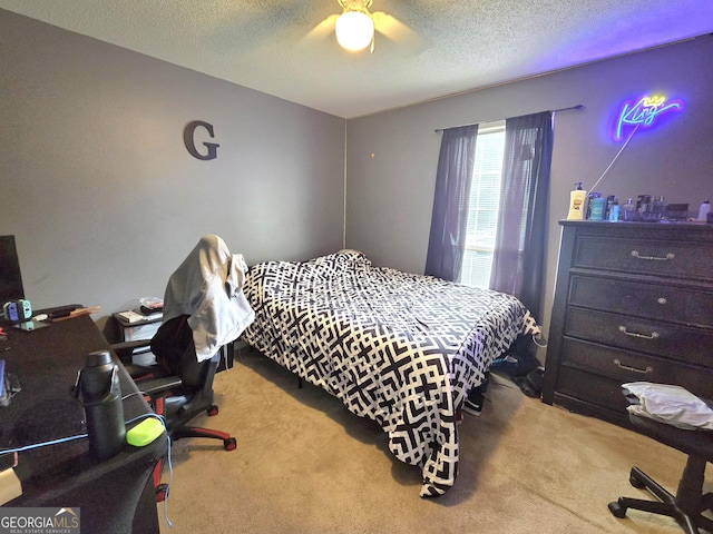 165 Cedar Ridge Rd, Locust Grove, GA 30248 - bedroom featuring carpet, a textured ceiling, and ceiling fan