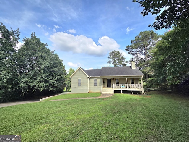 165 Cedar Ridge Rd, Locust Grove, GA 30248 - ranch-style home with a front yard and a chimney