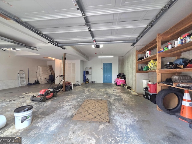 165 Cedar Ridge Rd, Locust Grove, GA 30248 - garage with a garage door opener