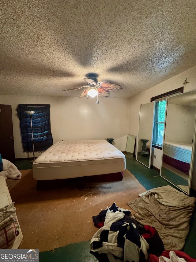 3411 Lake Ridge Pl, Gainesville, GA 30506 - bedroom with a textured ceiling and a ceiling fan