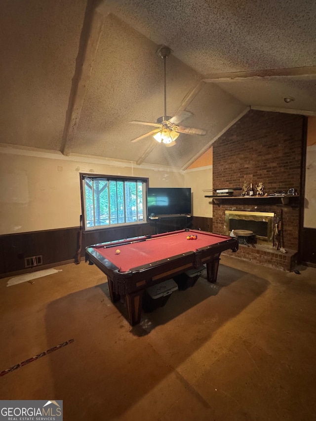 3411 Lake Ridge Pl, Gainesville, GA 30506 - recreation room featuring pool table, lofted ceiling, wainscoting, a ceiling fan, and a textured ceiling