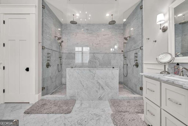 481 Meadow Lake Ter, Hoschton, GA 30548 - bathroom with marble finish floors, a marble finish shower, vanity, and recessed lighting