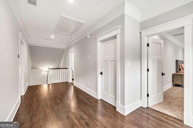 481 Meadow Lake Ter, Hoschton, GA 30548 - hallway featuring attic access, an upstairs landing, wood finished floors, recessed lighting, and crown molding