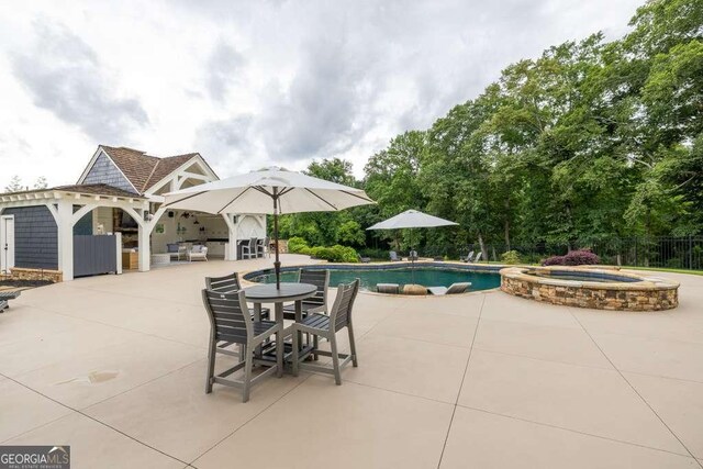 481 Meadow Lake Ter, Hoschton, GA 30548 - view of pool with a patio and a pool with connected hot tub