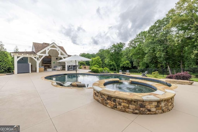 481 Meadow Lake Ter, Hoschton, GA 30548 - view of pool with a patio, view of scattered trees, and a pool with connected hot tub