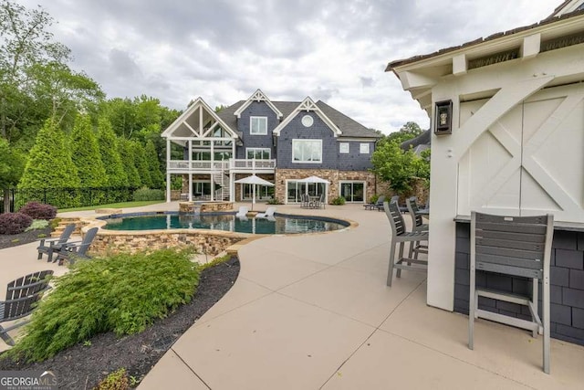 481 Meadow Lake Ter, Hoschton, GA 30548 - view of swimming pool with a patio area and an infinity pool