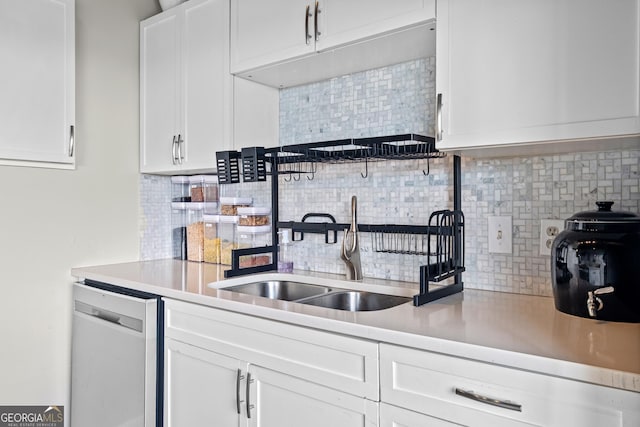 120 Ralph Mcgill Blvd NE Apt 1409, Atlanta, GA 30308 - kitchen with white cabinetry, light countertops, and decorative backsplash
