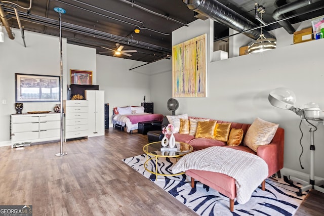 120 Ralph Mcgill Blvd NE Apt 1409, Atlanta, GA 30308 - bedroom with wood finished floors and a towering ceiling