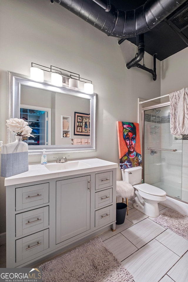 120 Ralph Mcgill Blvd NE Apt 1409, Atlanta, GA 30308 - bathroom featuring a shower stall and vanity