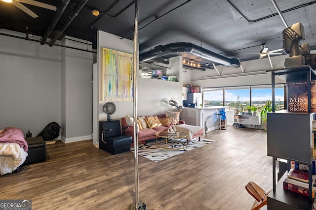 120 Ralph Mcgill Blvd NE Apt 1409, Atlanta, GA 30308 - below grade area with wood finished floors, a ceiling fan, and stainless steel fridge