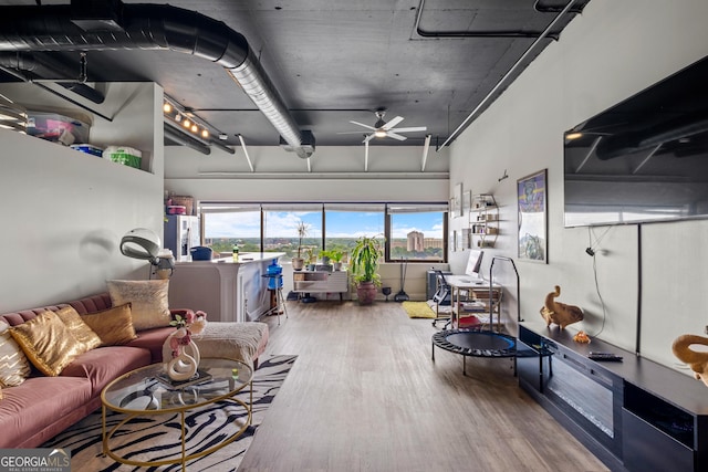120 Ralph Mcgill Blvd NE Apt 1409, Atlanta, GA 30308 - garage featuring a ceiling fan and stainless steel refrigerator with ice dispenser