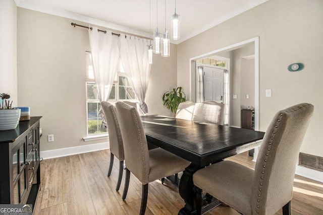 2275 Holly Run Dr, Jonesboro, GA 30236 - dining room featuring light wood-style floors