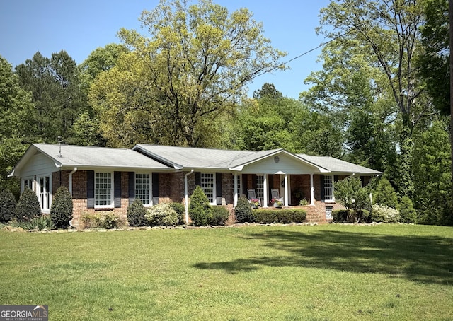 1055 E Hermitage Rd NE, Rome, GA 30161 - ranch-style house with covered porch, brick siding, and a front lawn